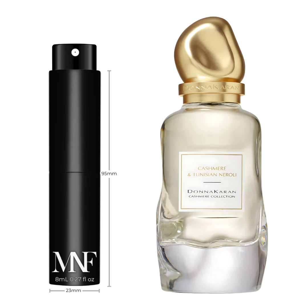 My Next Fragrance 8mL travel spray decant of Donna Karan Cashmere & Tunisian Neroli Eau de Parfum next to full bottle