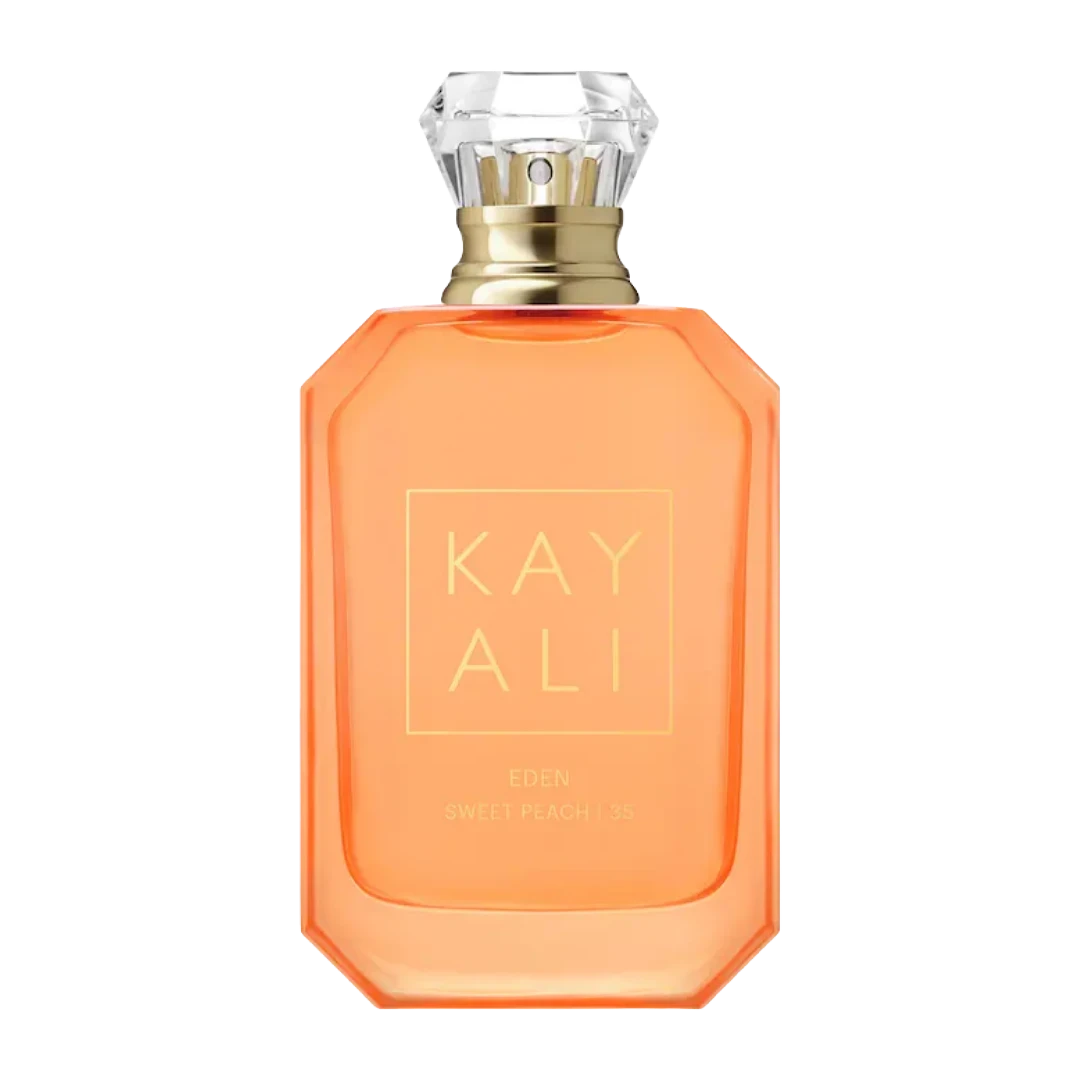 My Next Fragrance KAYALI Eden Sweet Peach 35 eau de parfum in a vibrant orange glass bottle with a diamond-cut cap.
