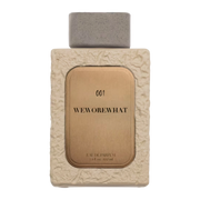 My Next Fragrance WeWoreWhat 001 Eau de Parfum bottle with textured cream casing and metallic gold label